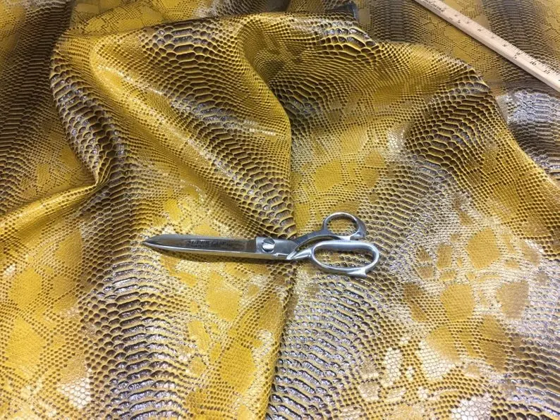 Gold Embossed Snake-Skin Vinyl Upholstery Fabric – Viper Sopythana Collection 1