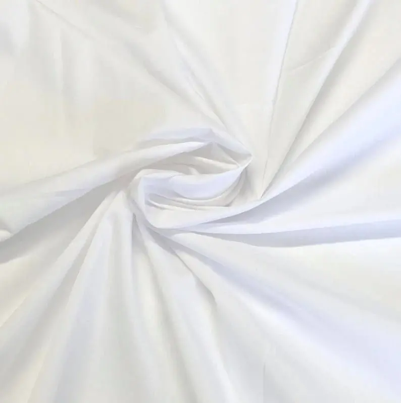 Pure White Solid Poly-Cotton Fabric – Smooth & Crisp Yard Roll 1
