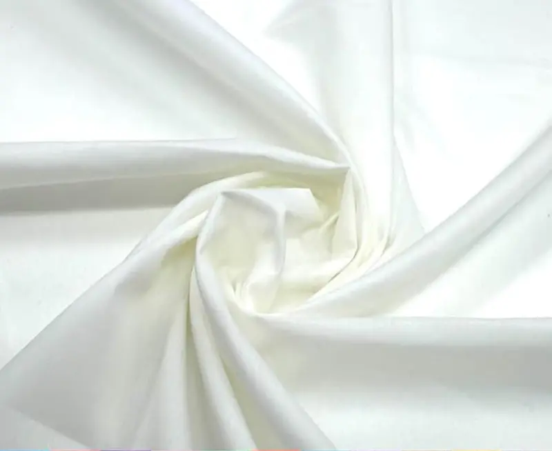 Timeless Ivory Broadcloth Fabric Featuring A Balanced Poly-Cotton Composition 1
