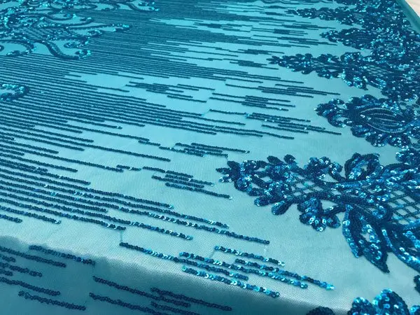 Turquoise Embroidered Stretch Sequin Fabric – Vibrant 4-Way Spandex Yardage 1